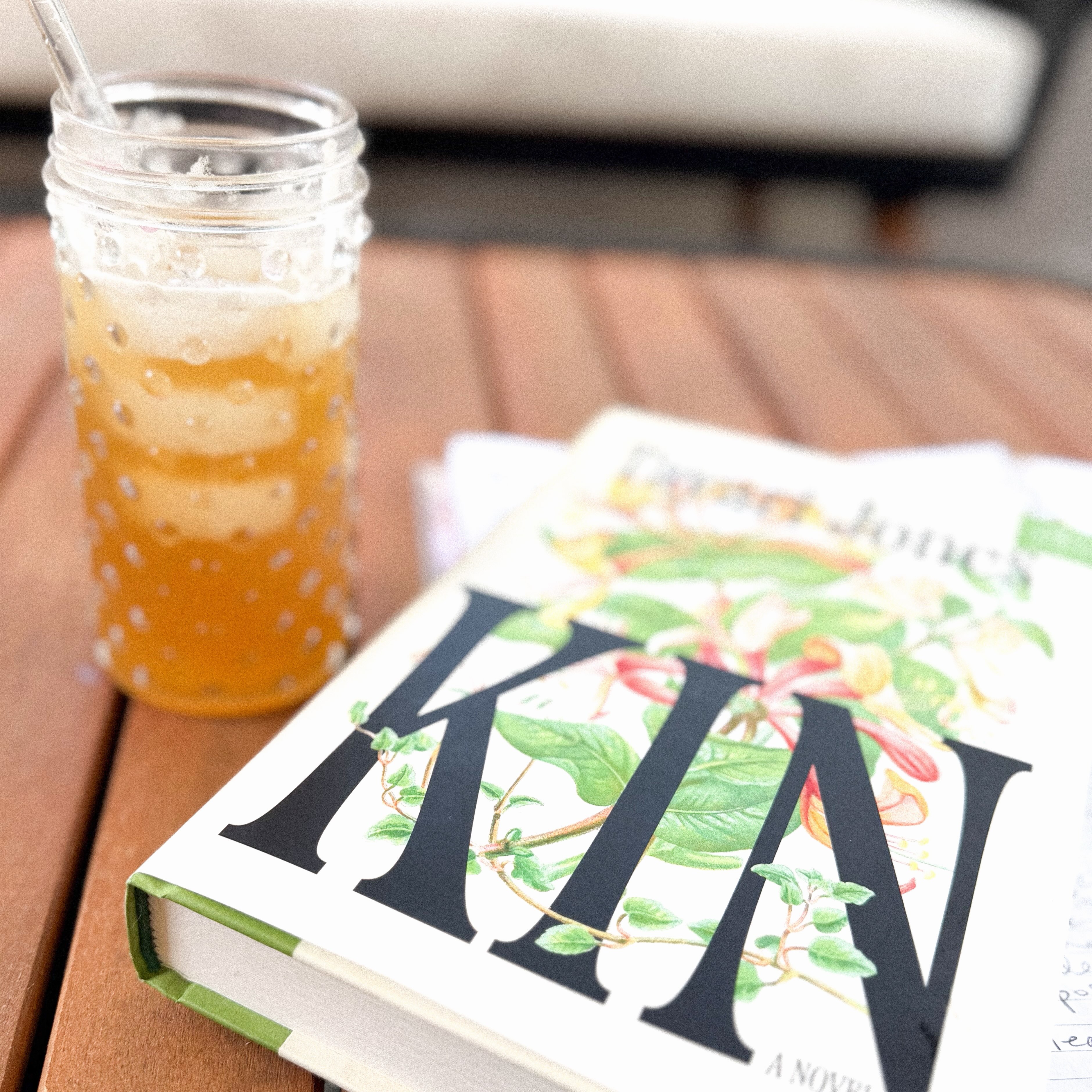 📖 🫖 Just a little #throwbackthursday to when it wasn’t too hot to hang out outside and enjoy an incredible book with a delightful beverage… Y’all. WHERE IS AUTUMN?! 😭